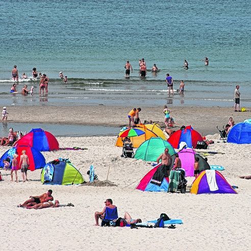 Sonne, Baden und Windsurfen
