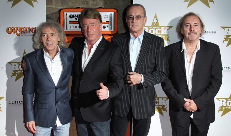 „Status Quo“ werden dem Publikum beim Marktplatz-Open Air in Rankweil einheizen. Foto: AP