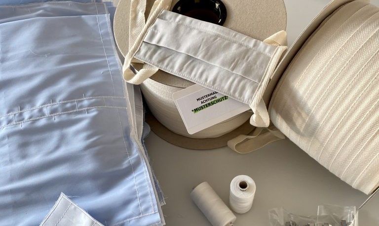 Wie Vorarlberger Firmen Hand in Hand Schutzmasken produzieren