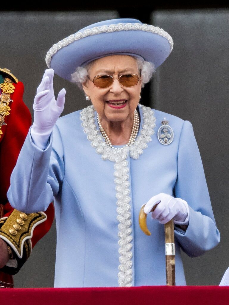 The Queen watches the special flypast by the Britain's RAF (Royal Air Force) from Buckingham Palace balcony following the Trooping the Colour parade, as a part of her platinum jubilee celebrations, in London, Britain June 2, 2022. Paul Grover/Pool via REUTERS