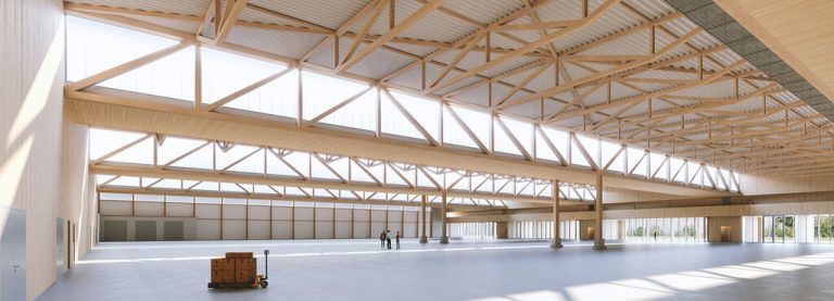 Wie groß die Fertigungshalle und das Dachtragwerk der SWG Schraubenwerk Gaisbach GmbH sind, beeindruckt Besucher und die Holzbaupreis-Jury. HK/Mark Lins