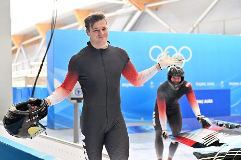 Kristian Huber nahm 2022 mit seinem Team an den Olympischen Spielen in Peking teil. <span class="copyright">afp</span>