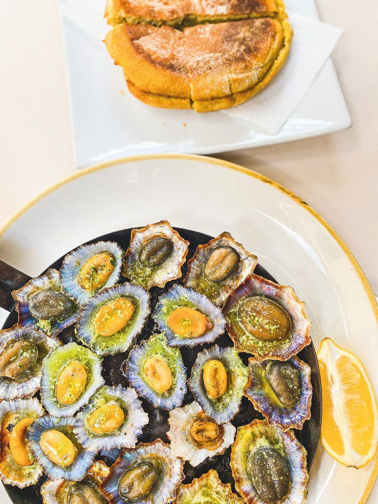 Lapas, Espada und Bolo de Caco