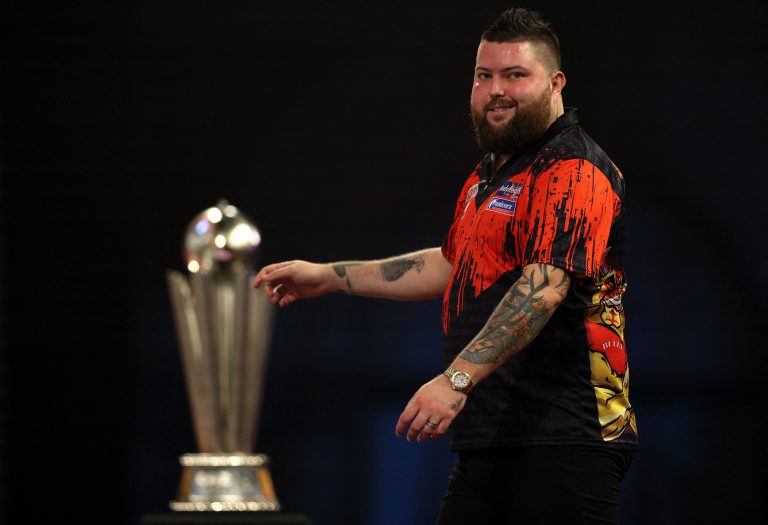 Der Engländer Michael Smith feierte vor einem Jahr seinen ersten WM-Titel. <span class="copyright">Adrian DENNIS/AFP</span>