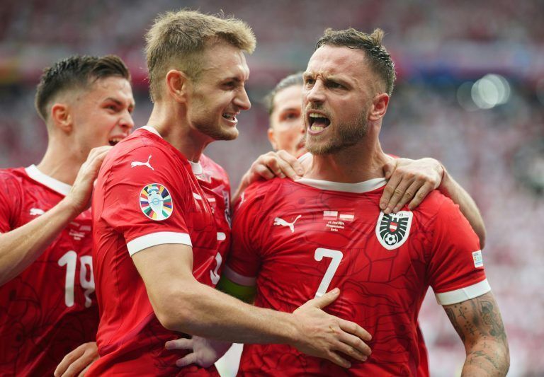 ABD0160_20240621 – BERLIN – DEUTSCHLAND: Marko Arnautovic (r./sterreich) jubelt mit Teamkollegen (v.l.n.r.) Christoph Baumgartner, Stefan Posch und Marcel Sabitzer ber seinen Treffer zum 1:3 am Freitag, 21. Juni 2024, anl. des UEFA EURO 2024-Spiels (Gruppe D/2. Runde) zwischen Polen und sterreich in Berlin. – FOTO: APA/GEORG HOCHMUTH