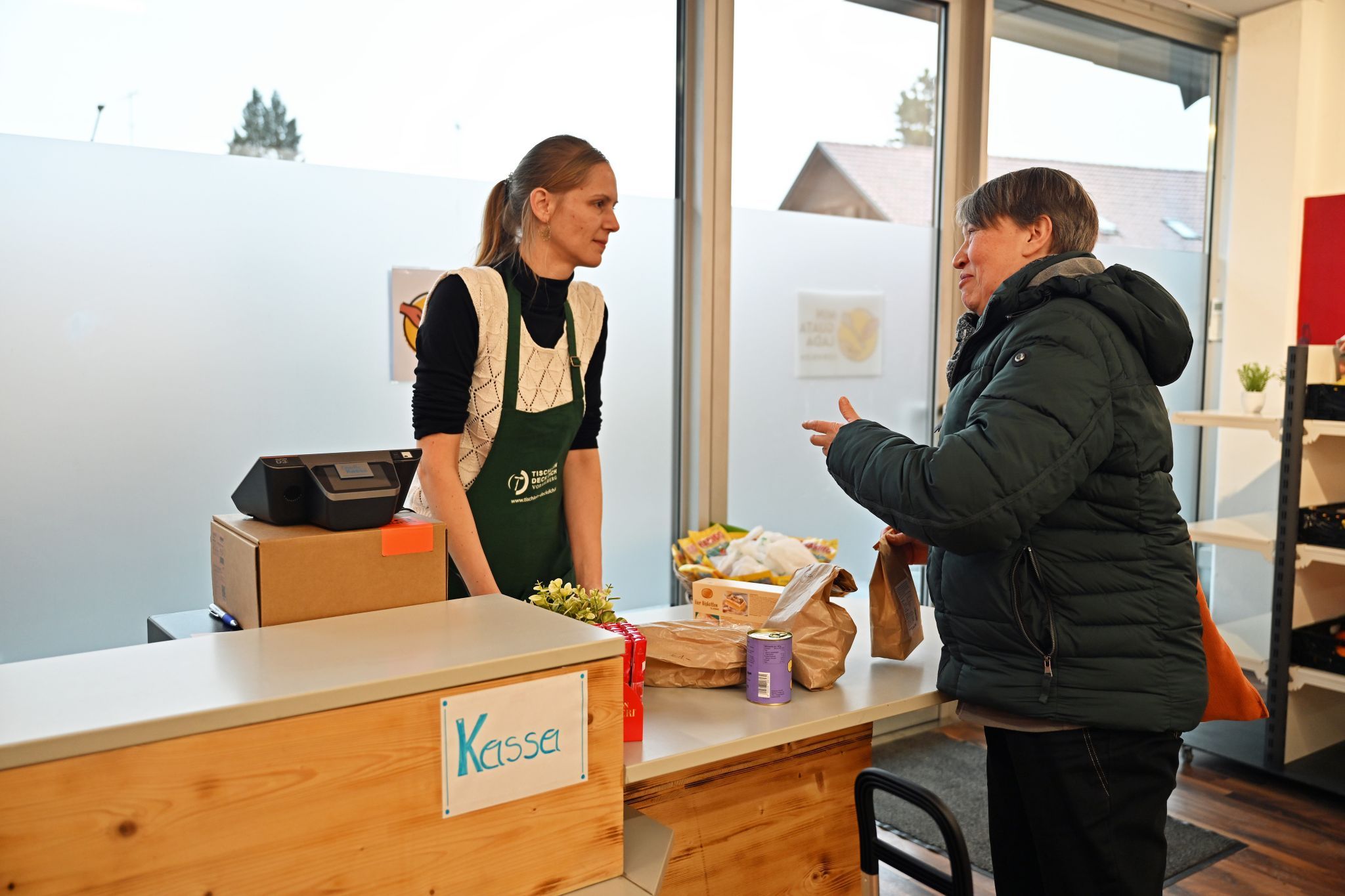 Wer im „MIN-GUATA-LADA“ einkauft, darf sich nicht gleichzeitig bei der Ausgabestelle von „Tischlein deck dich“ eindecken.