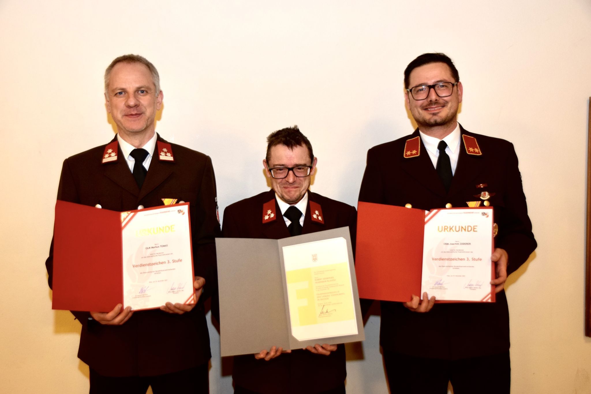 Die drei Geehrten: Markus Tomas, Robert Seeberger und Joachim Zoderer.