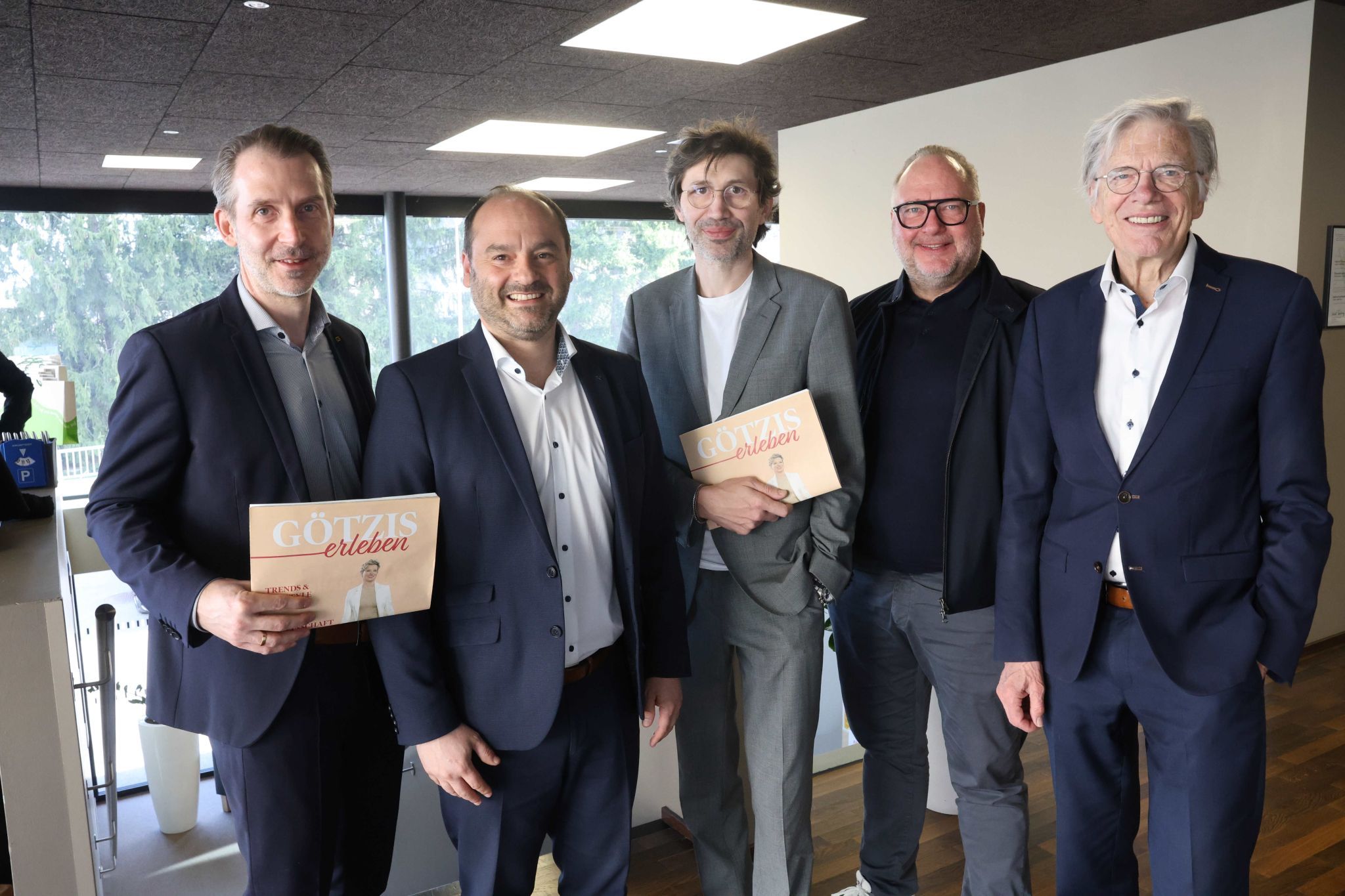 Uli Knoll und Angelo Sodneregger von der Raiba, Andreas Kopf (Uhren, Juwelen), Fotograf Jens Ellensohn und Helmut Kopf.