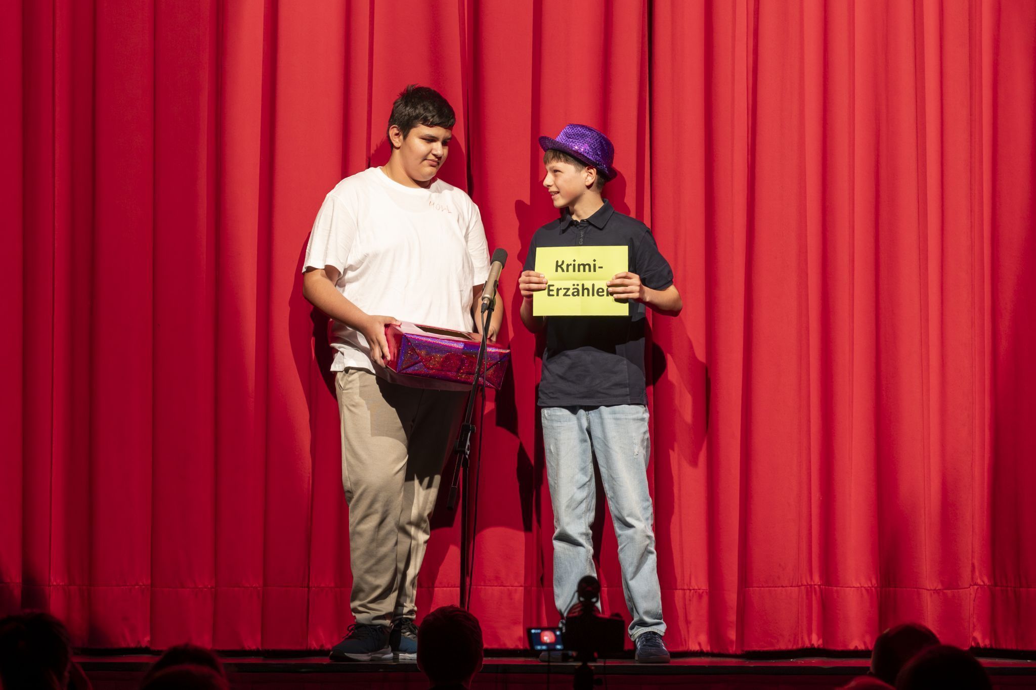 Eine etwas kriminelle Ankündigung des nächsten Programmpunktes