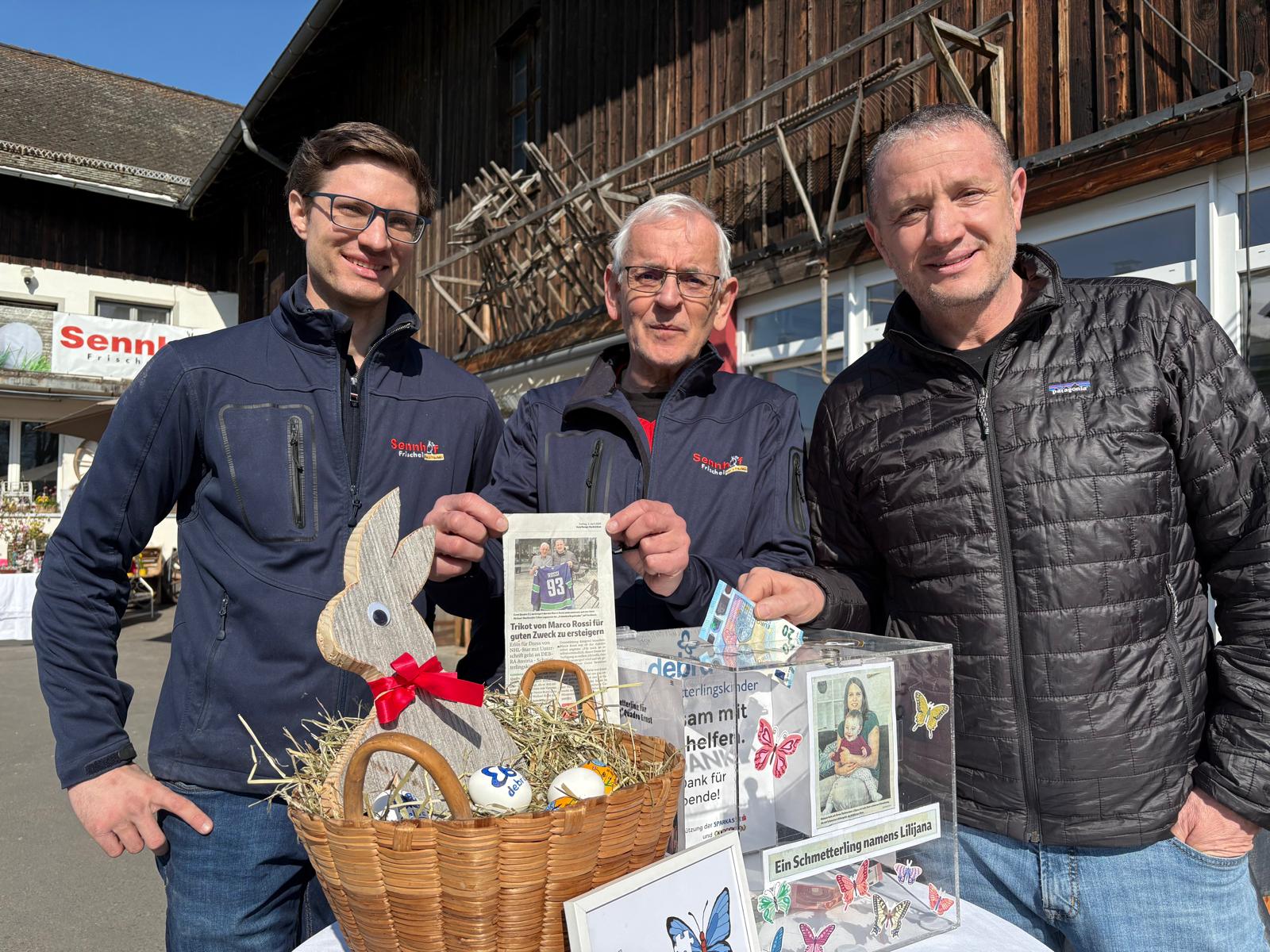 Matthias Allgäuer, Quadro Ernst und Michael Rossi am Spendentisch auf dem Sennhof.