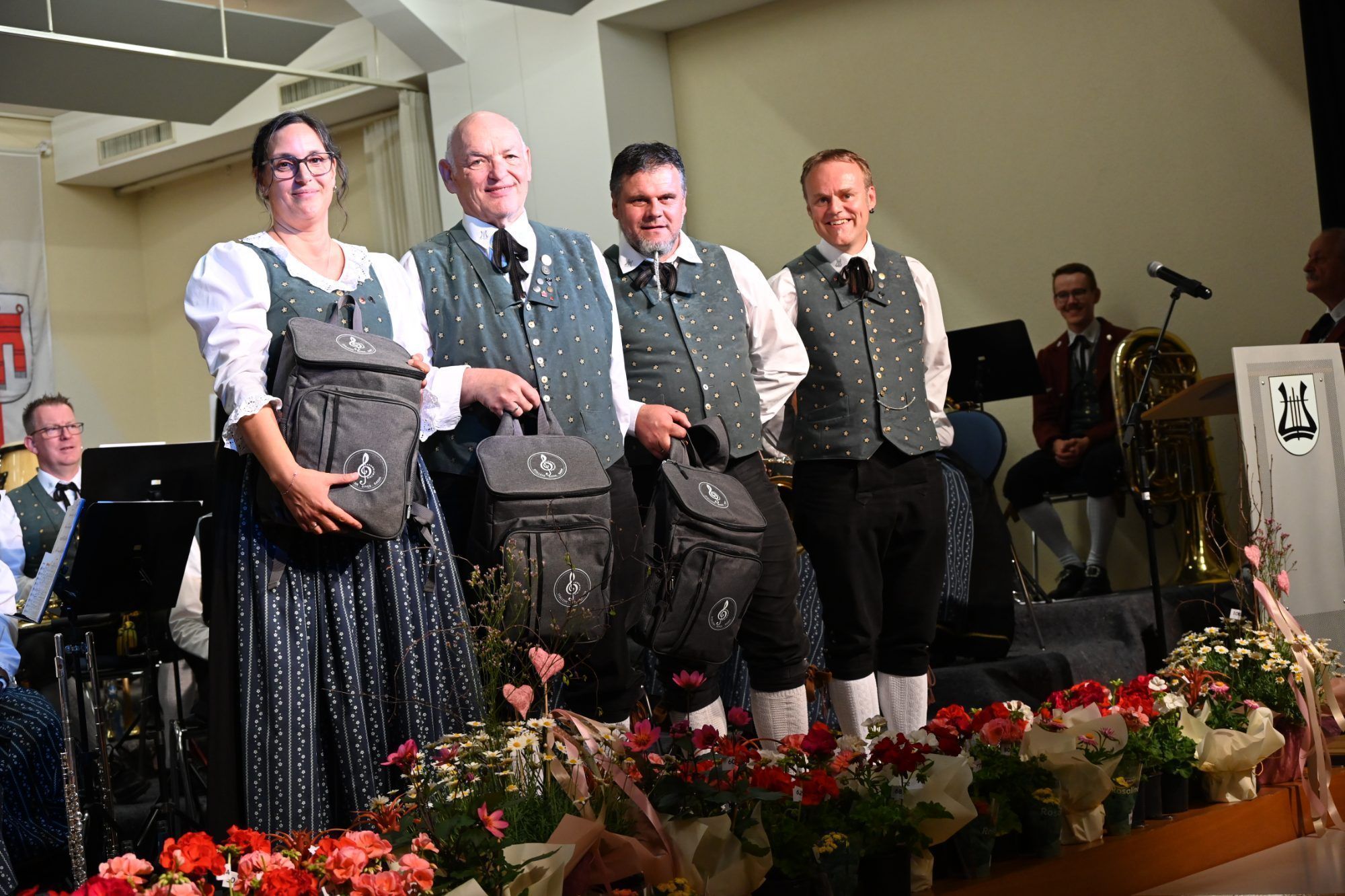 Jubilare der Harmoniemusik: Sabine Bachmann und Markus Micheli (20 Jahre), Christian Dünser (30 Jahre)