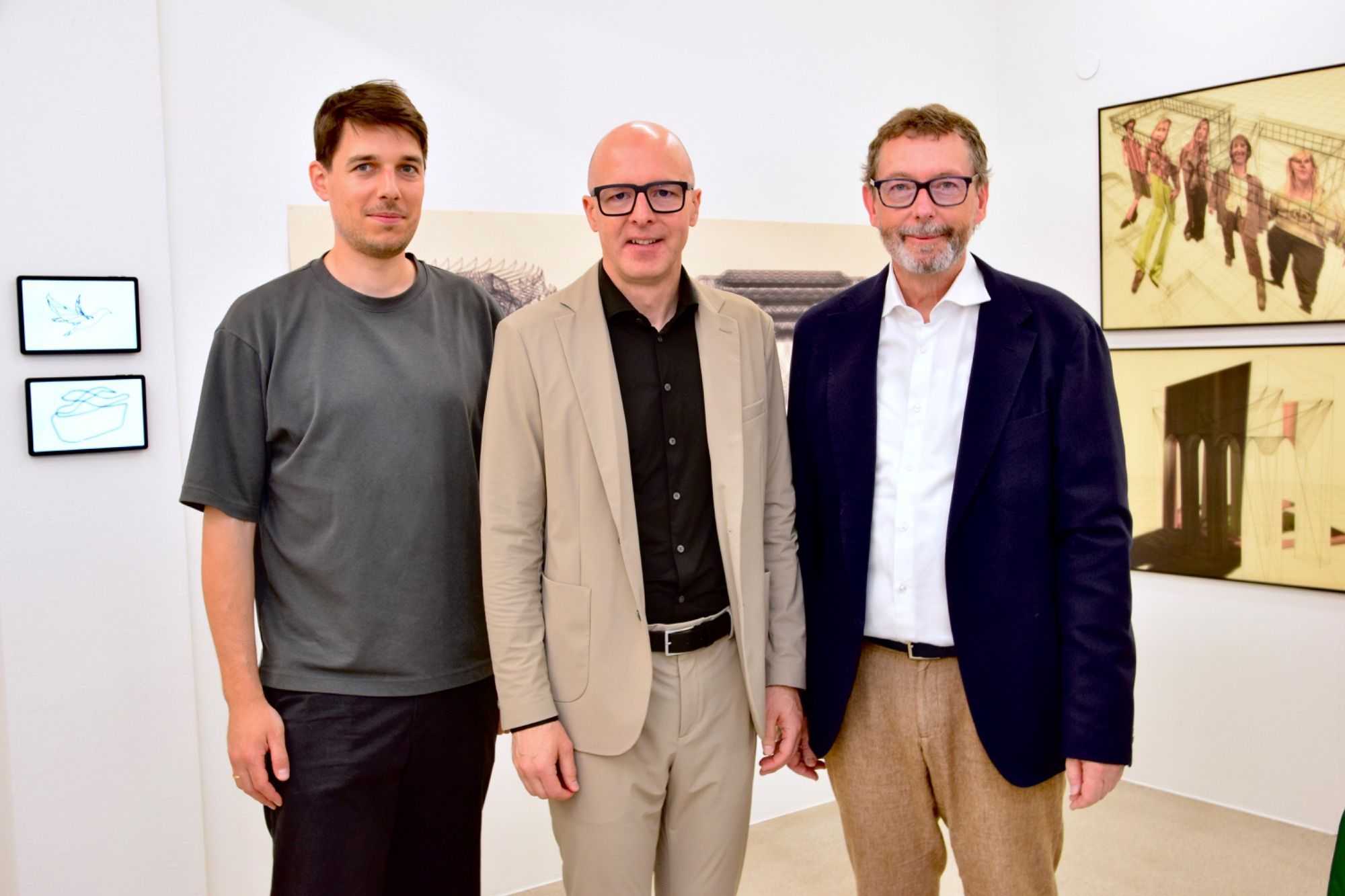 Galerist Simeon Brugger, Illwerke-VKW-Vorstandsmitglied Gerd Wegeler und Andreas Neuhauser, ebenfalls Illwerke VKW.