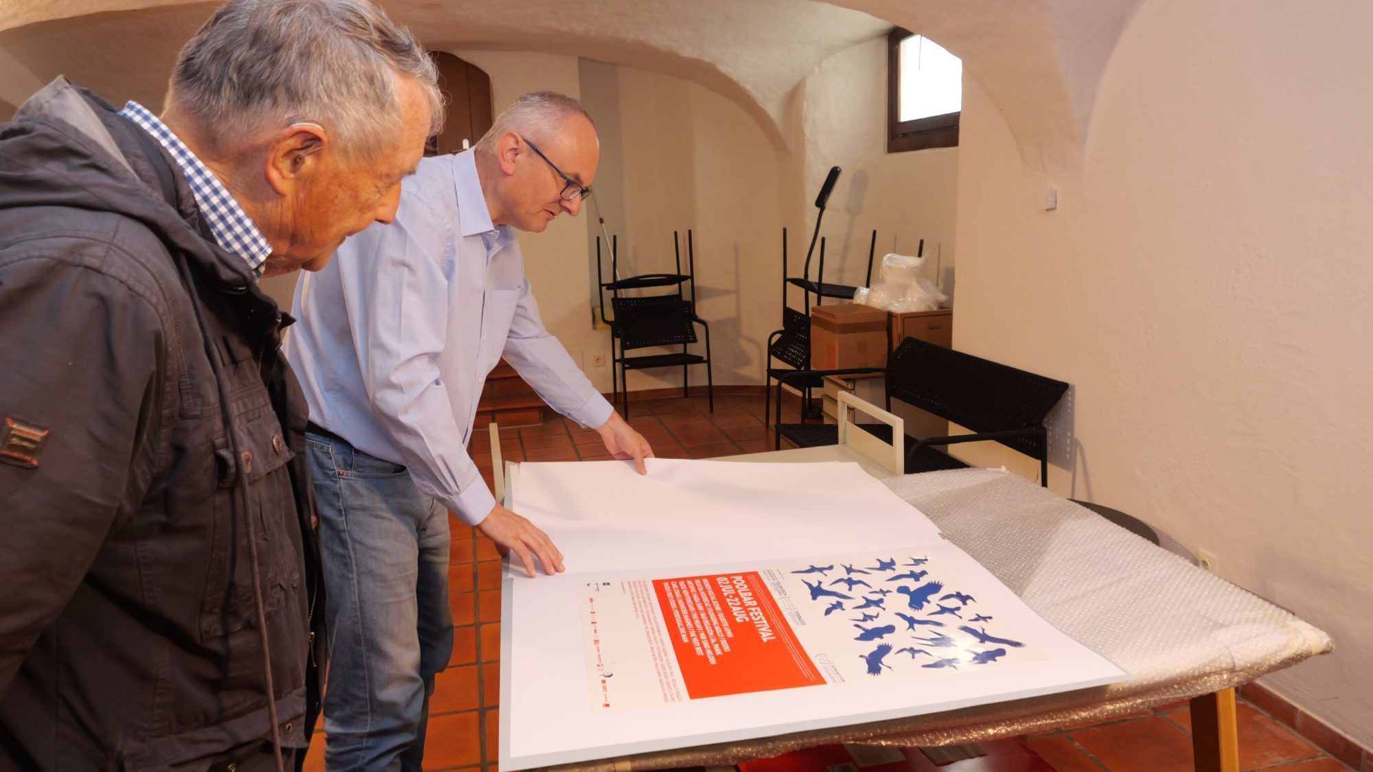 Historische Plakate zum Poolbar Festival sind auch ein Stück wirtschaftliche Stadtgeschichte.
