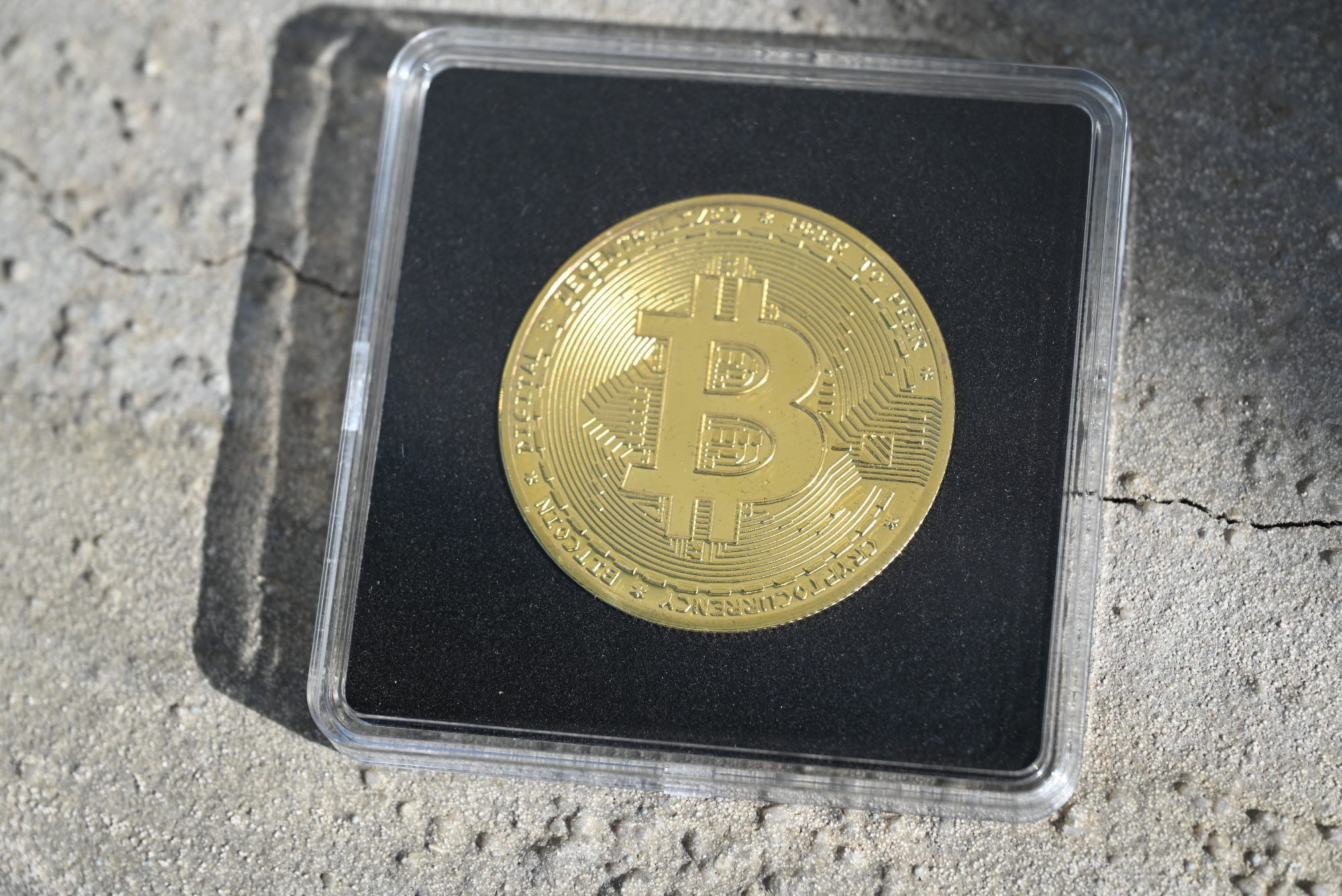 Die symbolische Bitcoin-Münze von Bestattung Reumiller.