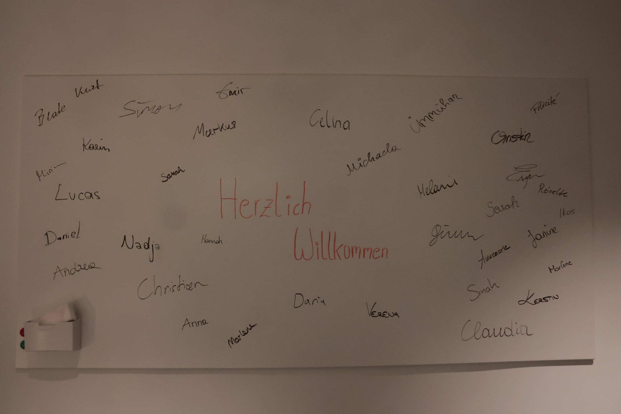 Willkommensgruß von Mitarbeiter:innen.
